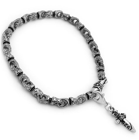 .925 Sterling Silver Twisted Blade Silver Bracelet With Intricate Engraved Couplings And Dagger Charm, <b>size: 7</b>